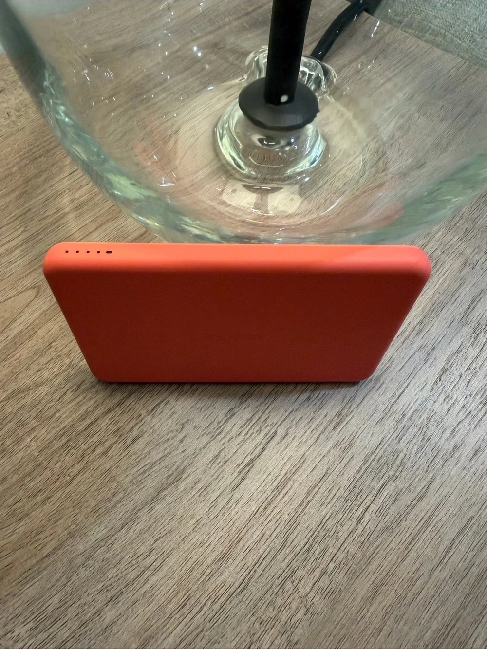Anker Coral Orange Power Bank, Satechi Magnetic Wallet Stand, and Pop Socket